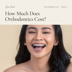 Smiling young woman wearing braces - orthodontics cost guide, Barton Dental