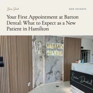 A patient checking in at the front desk of a Hamilton dental practice